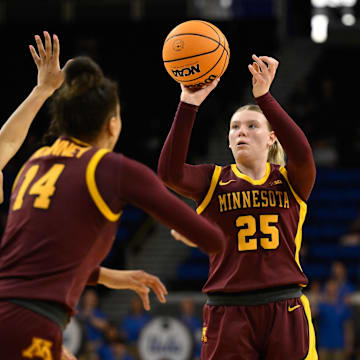 Feb 2, 2025; Los Angeles, California, USA; Minnesota Golden Gophers guard Grace Grocholski (25) shoots during the second quarter against the UCLA Bruins at Pauley Pavilion presented by Wescom. Mandatory Credit: Robert Hanashiro-Imagn Images