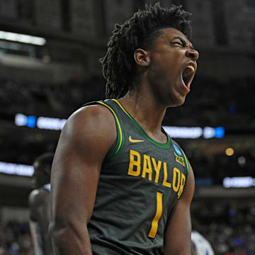 Mar 23, 2025; Raleigh, NC, USA; Baylor Bears guard Robert Wright III (1) reacts after a basket during the first half against the Duke Blue Devils in the second round of the NCAA Tournament at Lenovo Center. Mandatory Credit: Zachary Taft-Imagn Images