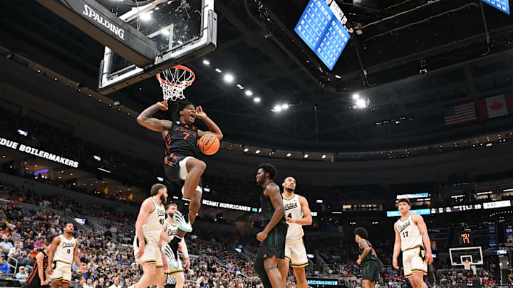 Mar 22, 2026; St. Louis, MO, USA; Miami Hurricanes forward Shelton Henderson (7) dunks during the first half against the Purdue Boilermakers during a second round game of the men's 2026 NCAA Tournament at Enterprise Center. Mandatory Credit: Jeff Curry-Imagn Images