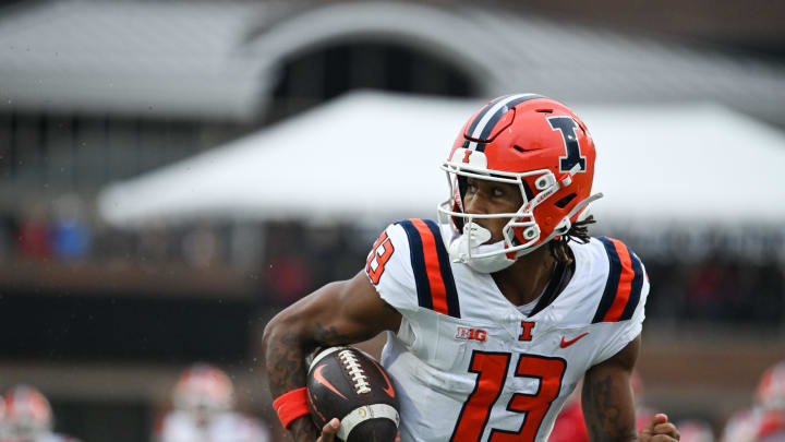 Oct 14, 2023; College Park, Maryland, USA; Illinois Fighting Illini wide receiver Pat Bryant (13) runs for a first half touchdown against the Maryland Terrapins   at SECU Stadium. Mandatory Credit: Tommy Gilligan-USA TODAY Sports