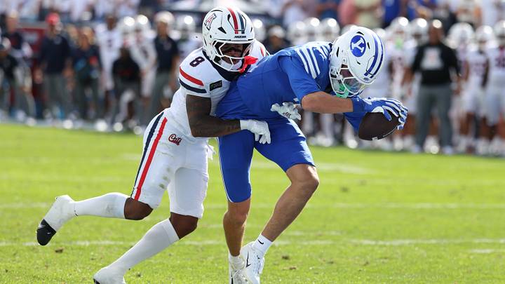 Sep 12, 2026; Provo, Utah, USA;  BYU Cougars wide receiver Kyler Kasper (3) reaches to score a touchdown against Arizona Wildcats cornerback Jay'vion Cole (8) during the second half at LaVell Edwards Stadium.  Mandatory Credit: Rob Gray-Imagn Images