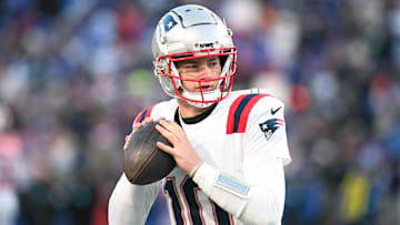 Dec 22, 2024; Orchard Park, New York, USA; New England Patriots quarterback Drake Maye (10) warms up before a game against the Buffalo Bills at Highmark Stadium. Mandatory Credit: Mark Konezny-Imagn Images