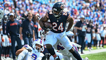Aug 10, 2024; Orchard Park, New York, USA; Chicago Bears running back Khalil Herbert (24) carries the ball against the  Buffalo Bills in the first quarter of a pre-season game at Highmark Stadium. Mandatory Credit: Mark Konezny-Imagn Images
