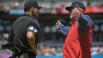 Atlanta Braves manager Brian Snitker argues a call with umpire Gabe Morales (47) during the fifth inning of the game against the San Francisco Giants at Oracle Park.