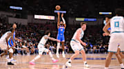 Oct 5, 2025; North Charleston, South Carolina, USA; Oklahoma City Thunder guard Isaiah Joe (11) shoots a three-point shot against the Charlotte Hornets in the first quarter at North Charleston Coliseum. Mandatory Credit: Arthur Ellis-Imagn Images