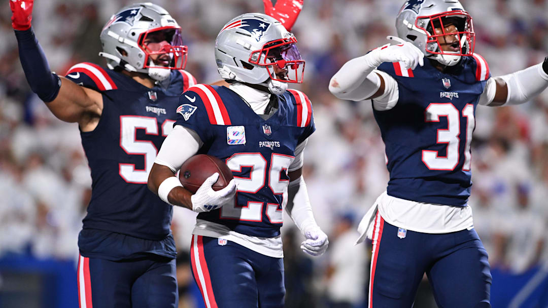 Oct 5, 2025; Orchard Park, New York, USA; New England Patriots cornerback Marcus Jones (25) reacts after an interception against the Buffalo Bills during the second half at Highmark Stadium. Mandatory Credit: Mark Konezny-Imagn Images