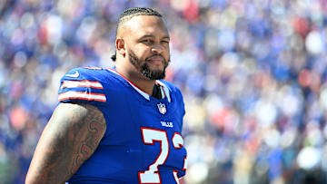 Sep 28, 2025; Orchard Park, New York, USA;  Buffalo Bills offensive tackle Dion Dawkins (73) on the sidelines during the second quarter against the New Orleans Saints at Highmark Stadium.