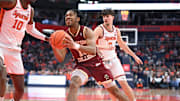 Boston College Eagles guard Donald Hand Jr. (13) looks to the basket to take a shot as Syracuse Orange center Naheem McLeod (10) and forward Petar Majstorovic (6) defend in the first half at the JMA Wireless Dome.