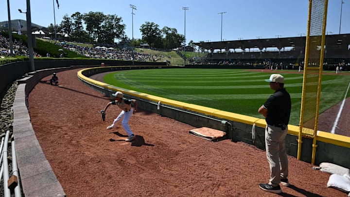 Ciou Zhi-Kai (8) warms up before a game at Lamade Stadium at the Little League World Series on Aug. 25, 2024.