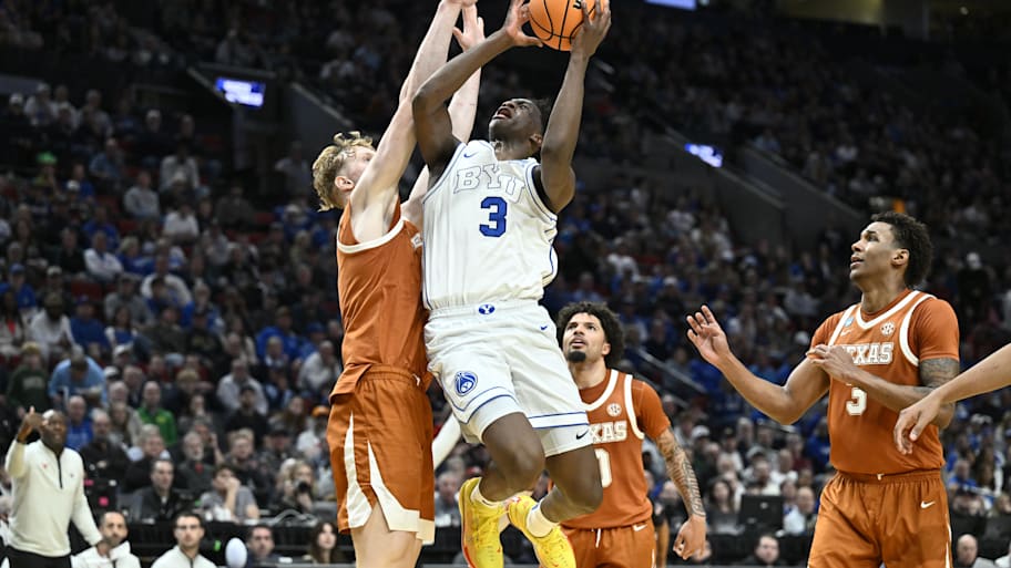 BYU forward AJ Dybantsa shoots against Texas center Matas Vokietaitis during a first-round game of the NCAA men’s tournament.