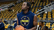 Oct 27, 2024; Indianapolis, Indiana, USA;  Indiana Pacers forward Aaron Nesmith (23) warms up before the game against the Philadelphia 76ers at Gainbridge Fieldhouse.