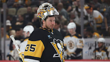 Apr 13, 2025; Pittsburgh, Pennsylvania, USA;  Pittsburgh Penguins goaltender Tristan Jarry (35) returns to his net against the Boston Bruins during the second period at PPG Paints Arena. Mandatory Credit: Charles LeClaire-Imagn Images
