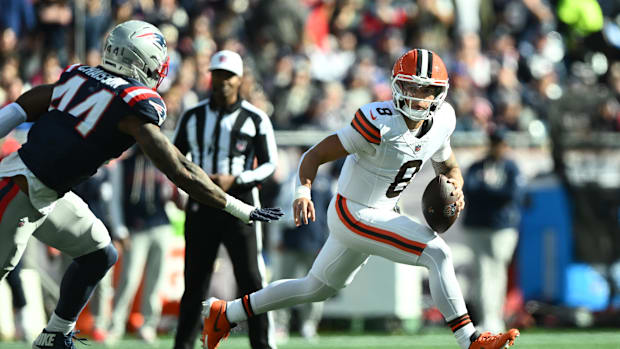 Oct 26, 2025; Foxborough, Massachusetts, USA;  Cleveland Browns quarterback Dillon Gabriel (8) runs with the ball defended by