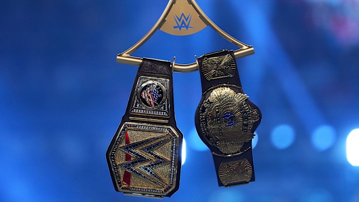 Details of the WWE Undisputed Championship belt and the Winged Eagle belt during the WWE Royal Rumble at Lucas Oil Stadium. 