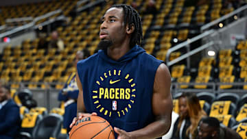 Oct 27, 2024; Indianapolis, Indiana, USA;  Indiana Pacers forward Aaron Nesmith (23) warms up before the game against the Philadelphia 76ers at Gainbridge Fieldhouse. Mandatory Credit: Marc Lebryk-Imagn Images