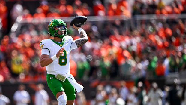 Oregon Ducks quarterback Dillon Gabriel (8) throws a touchdown pass in the first half of the annual rivalry game against the 