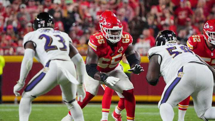Sep 5, 2024; Kansas City, Missouri, USA; Kansas City Chiefs guard Trey Smith (65) at the line of scrimmage against the Baltimore Ravens during the game at GEHA Field at Arrowhead Stadium. Mandatory Credit: Denny Medley-Imagn Images