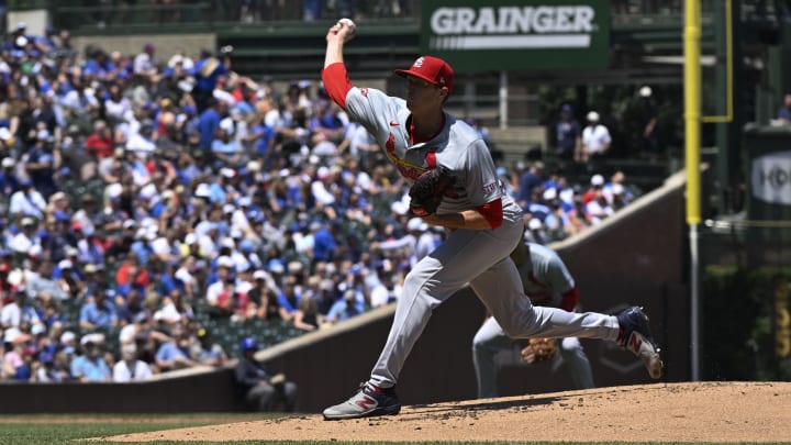 Jun 14, 2024; Chicago, Illinois, USA;  St. Louis Cardinals pitcher Kyle Gibson delivers during the first inning against the Chicago Cubs at  Wrigley Field. 