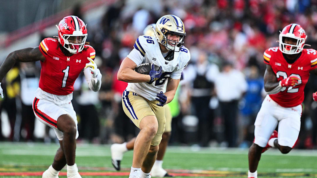 Oct 4, 2025; College Park, Maryland, USA;  Washington Huskies tight end Decker DeGraaf (86) carries the ball against the Maryland Terrapins at SECU Stadium. Mandatory Credit: Jamie Sabau-Imagn Images
