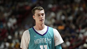 Jul 12, 2025; Las Vegas, NV, USA; Charlotte Hornets center Ryan Kalkbrenner (11) looks on during the game against the Philadelphia 76ers in the first quarter of their game at Thomas & Mack Center. Mandatory Credit: Candice Ward-Imagn Images