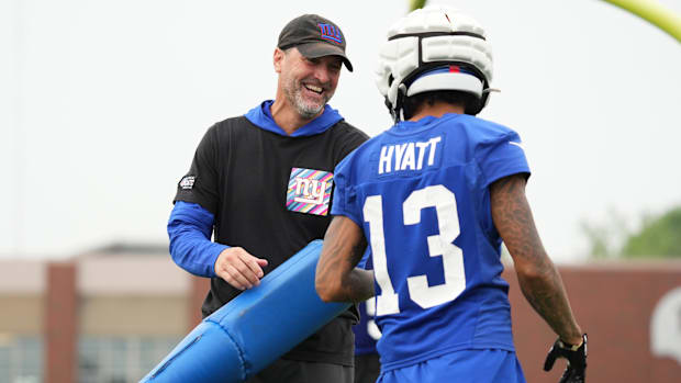 NY Giants wide receivers coach Mike Groh works with wide receiver Jalin Hyatt  