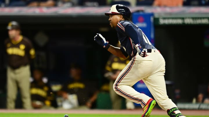 Jul 19, 2024; Cleveland, Ohio, USA; Cleveland Guardians third baseman Jose Ramirez (11) hits an RBI single during the eighth inning against the San Diego Padres at Progressive Field. Mandatory Credit: Ken Blaze-USA TODAY Sports