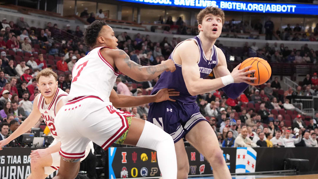 Mar 11, 2026; Chicago, IL, USA: Indiana Hoosiers forward Nick Dorn (7) defends Northwestern Wildcats forward Nick Martinelli (2) during the second half at United Center. Mandatory Credit: David Banks-Imagn Images