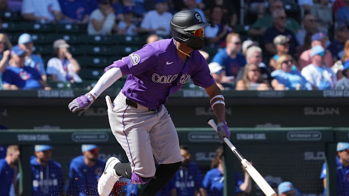 Feb 25, 2026; Mesa, Arizona, USA; Colorado Rockies left fielder Willi Castro (3) hits a single against the Chicago Cubs in the first inning at Sloan Park. Mandatory Credit: Rick Scuteri-Imagn Images