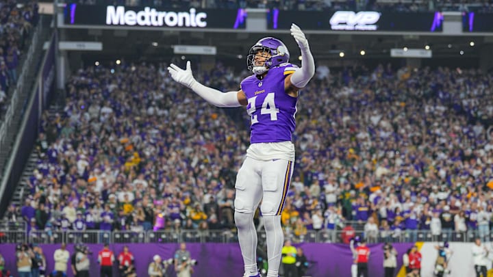 Dec 29, 2024; Minneapolis, Minnesota, USA; Minnesota Vikings safety Camryn Bynum (24) interacts with fans against Green Bay Packers in the first quarter at U.S. Bank Stadium. Mandatory Credit: Brad Rempel-Imagn Images