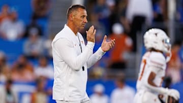 Texas Longhorns head coach Steve Sarkisian claps during warmups before the game against the Kentucky Wildcats, Oct. 18, 2025 at Kroger Field in Lexington, Kentucky.