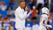 Texas Longhorns head coach Steve Sarkisian claps during warmups before the game against the Kentucky Wildcats at Kroger Field. 