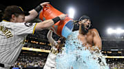 Fernando Tatis Jr. gets doused with a Gatorade cooler after delivering a walk-off hit for the San Diego Padres in the club's 6-5 win over the Detroit Tigers on Wednesday night at Petco Park. 