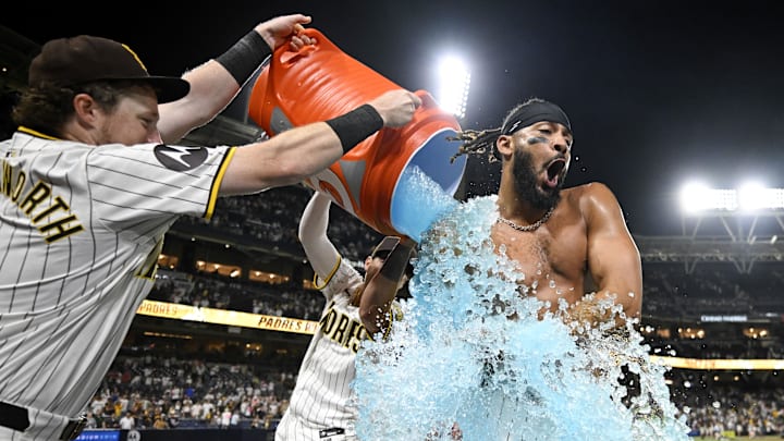 Fernando Tatis Jr. gets doused with a Gatorade cooler after delivering a walk-off hit for the San Diego Padres in the club's 6-5 win over the Detroit Tigers on Wednesday night at Petco Park. 