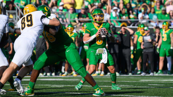 Aug 31, 2024; Eugene, Oregon, USA; Oregon Ducks quarterback Dillon Gabriel (8) sets up to pass during the second quarter against the Idaho Vandals at Autzen Stadium. Mandatory Credit: Craig Strobeck-USA TODAY Sports