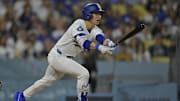Hyeseong Kim singles against the Padres on June 19.