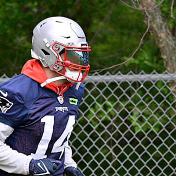 Jun 9, 2025; Foxborough, MA, USA; New England Patriots linebacker Robert Spillane (14) walks to the practice fields at Gillette Stadium. Mandatory Credit: Eric Canha-Imagn Images