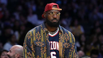 Oct 24, 2025; Los Angeles, California, USA; Los Angeles Lakers forward LeBron James wears the Arizona Wildcats jersey of his son Bryce James (6) during the game against the Minnesota Timberwolves at Crypto.com Arena. Mandatory Credit: Kirby Lee-Imagn Images