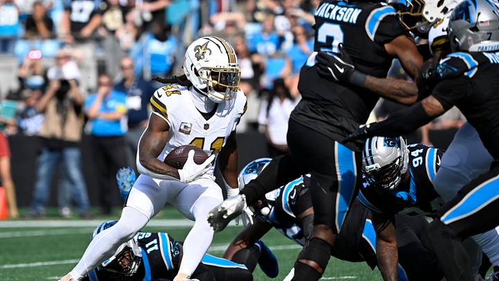 Nov 9, 2025; Charlotte, North Carolina, USA;  New Orleans Saints running back Alvin Kamara (41) runs in the first quarter at Bank of America Stadium. Mandatory Credit: Bob Donnan-Imagn Images
