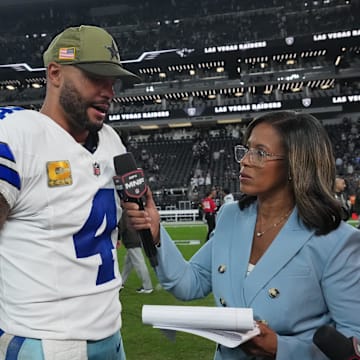Dallas Cowboys quarterback Dak Prescott is interviewed by ESPN’s Lisa Salters following a game against the Las Vegas Raiders 