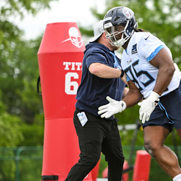 May 10, 2025; Nashville, TN, USA;  Tennessee Titans defensive tackle Philip Blidi (95) goes through drills during Rookie Mini Camp at Saint Thomas Sports Park. Mandatory Credit: Steve Roberts-Imagn Images