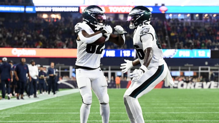 Aug 15, 2024; Foxborough, Massachusetts, USA; Philadelphia Eagles wide receiver Ainias Smith (82) celebrates with wide receiver Joseph Ngata (86) after scoring an extra point against the New England Patriots during the second half at Gillette Stadium. Mandatory Credit: Brian Fluharty-USA TODAY Sports