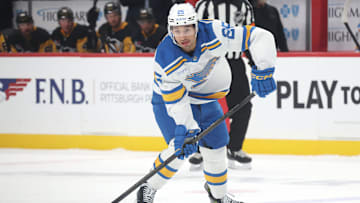 Oct 27, 2025; Pittsburgh, Pennsylvania, USA; St. Louis Blues right wing Jordan Kyrou (25) passes the puck against the Pittsburgh Penguins during the second period at PPG Paints Arena. Mandatory Credit: Charles LeClaire-Imagn Images