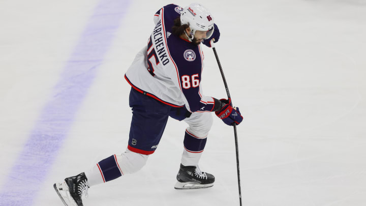 Apr 11, 2024; Sunrise, Florida, USA; Columbus Blue Jackets right wing Kirill Marchenko (86) shoots the puck against the Florida Panthers during the first period at Amerant Bank Arena. Mandatory Credit: Sam Navarro-USA TODAY Sports