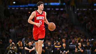 Apr 11, 2025; Los Angeles, California, USA; Houston Rockets guard Reed Sheppard (15) moves the ball against the Los Angeles Lakers during the second half at Crypto.com Arena. Mandatory Credit: Jonathan Hui-Imagn Images