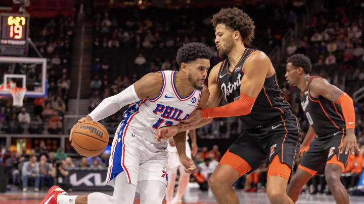 Nov 10, 2023; Detroit, Michigan, USA; Detroit Pistons guard Cade Cunningham (2) defends against Philadelphia 76ers forward Tobias Harris (12) during the in the first half at Little Caesars Arena. Mandatory Credit: David Reginek-USA TODAY Sports