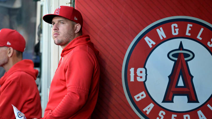 Jun 19, 2024; Anaheim, California, USA;  Los Angeles Angels center fielder Mike Trout (27) looks on from the dugout against the Milwaukee Brewers at Angel Stadium. Mandatory Credit: Jayne Kamin-Oncea-USA TODAY Sports