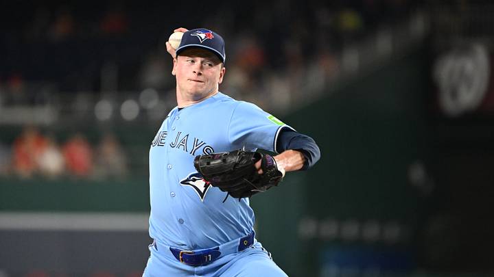 Jul 27, 2026; Washington, District of Columbia, USA; Toronto Blue Jays pitcher Louis Varland (77) throws a pitch against the Washington Nationals during the ninth at Nationals Park. Mandatory Credit: Rafael Suanes-Imagn Images