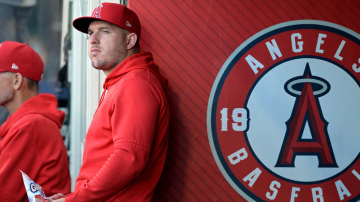 Jun 19, 2024; Anaheim, California, USA;  Los Angeles Angels center fielder Mike Trout (27) looks on from the dugout against the Milwaukee Brewers at Angel Stadium. Mandatory Credit: Jayne Kamin-Oncea-USA TODAY Sports