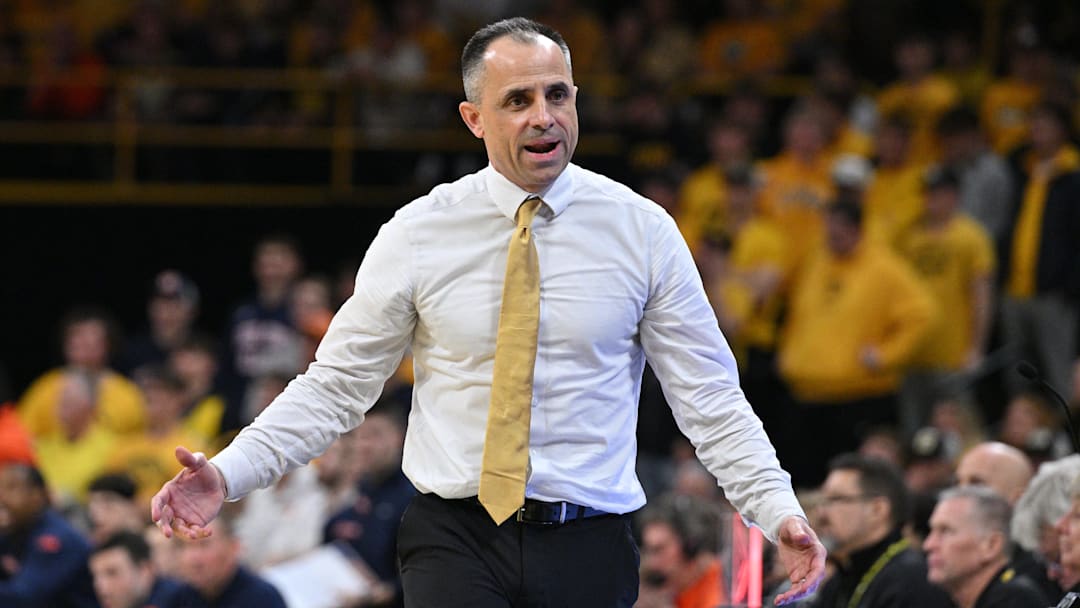 Iowa Hawkeyes head coach Ben McCollum 