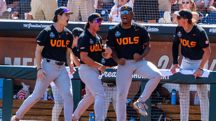 Jun 23, 2024; Omaha, NE, USA; The Tennessee Volunteers celebrate after a two-run home run by left fielder Dylan Dreiling (not pictured) against the Texas A&M Aggies during the seventh inning at Charles Schwab Field Omaha. Mandatory Credit: Dylan Widger-USA TODAY Sports